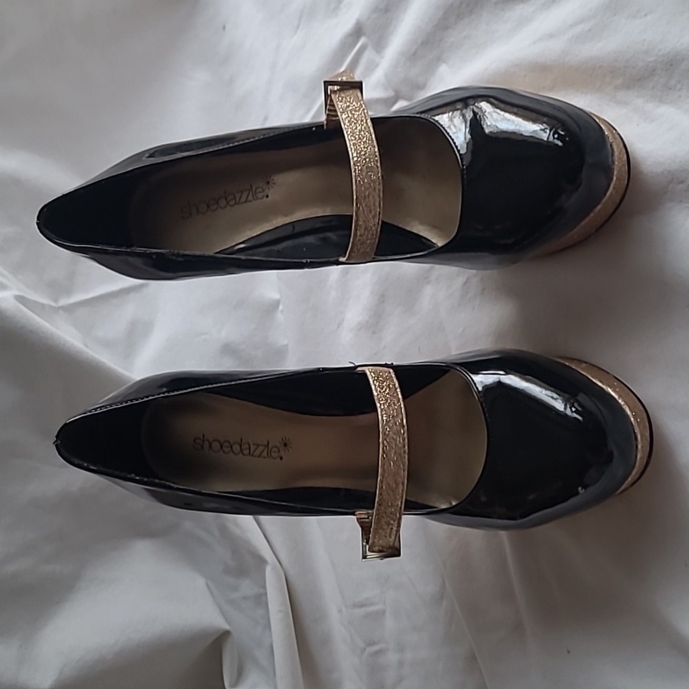Size 8.5 shiny black and sparkly gold platform high heels